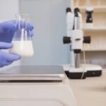 scientific weighing white liquid beaker 13339 133146 What Can Milk Protein Analysis Reveal About Dairy Quality?